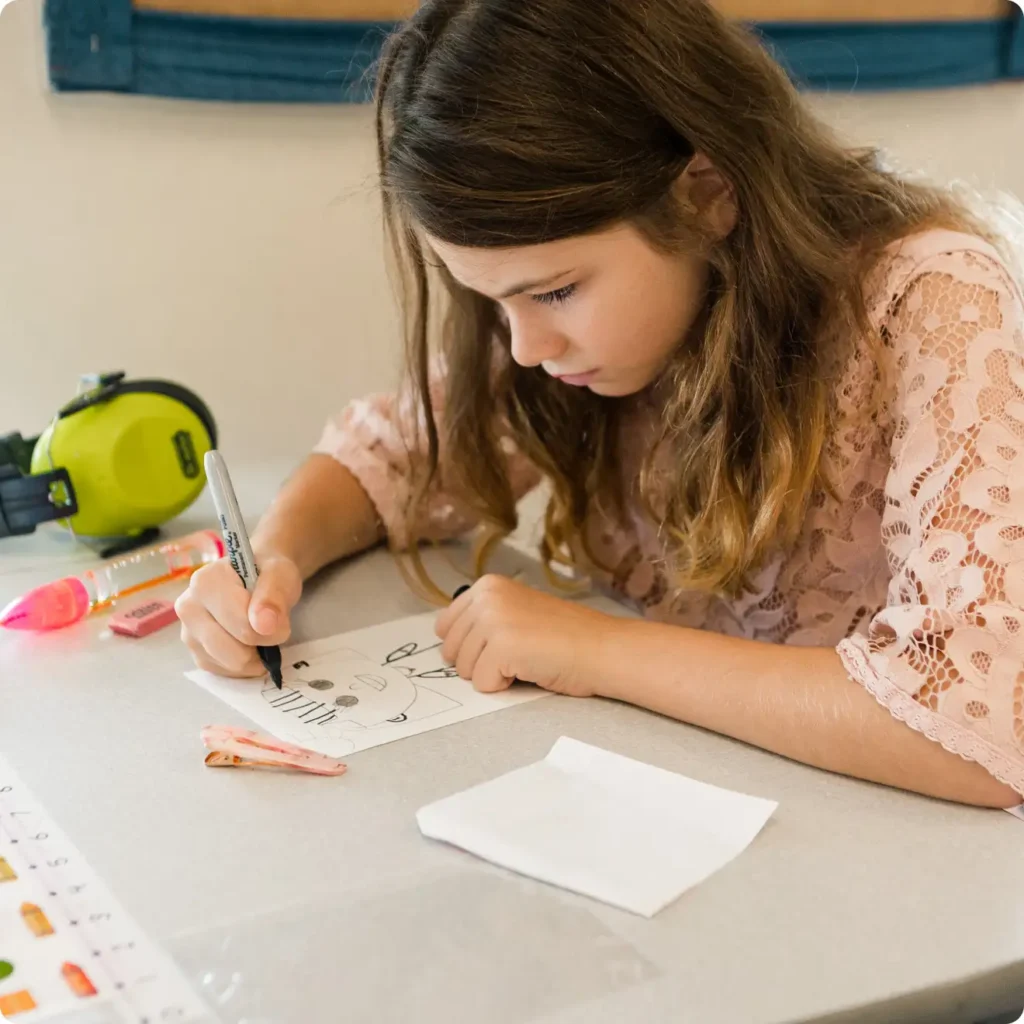 Child working on her own