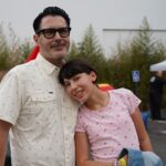 dad and his smiling daughter